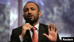 FILE - Haneef Atmar, serving as Afghanistan Education Minister, addresses a panel discussion on education during the Clinton Global Initiative in New York.
