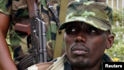 FILE - General Sultani Makenga, military leader of the M23 rebels, addresses the media in Bunagana, in eastern Democratic Republic of Congo, September 8, 2013.