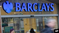 FILE - Barclays and other banks have severed ties with transfer firms that send remittances to Somalis. Interrupting the estimated $1 billion in annual remittances could have dire consequences, aid groups say.