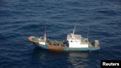 FILE - A Chinese fishing boat is shown Dec. 29, 2012. The Argentine coast guard sunk a Chinese trawler illegally fishing in its territorial waters, according to reports Tuesday.