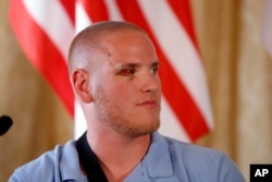 U.S. Airman Spencer Stone attends a press conference held at the U.S. Ambassador's residence in Paris, France, Aug. 23, 2015.