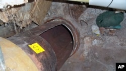 This photo provided by New York State Governor's office shows the area where two convicted murderers used power tools to cut through steel pipes, and leave a note, at a maximum-security prison in Dannemora, NY, and escaped through a manhole, June 6, 2015.