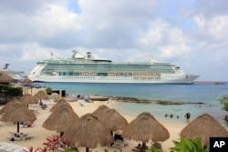 The cruise ship Brilliance of the Seas is docked in the waters of Cozumel, Mexico, March 19, 2016. The U.S. Coast Guard said the ship picked up 18 Cuban migrants near Marco Island, Florida.