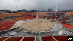 FILE - The Pyeongchang Olympic Stadium is under construction in Pyeongchang, South Korea, Nov. 25, 2017. 