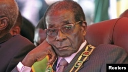 Presidente Robert Mugabe, do Zimbabwe. 