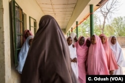 Students from Dapchi girls school return to school for the first day after Boko Haram invaded the campus in February, abducting more than 100 students.