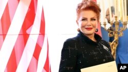 FILE - Georgette Mosbacher is seen after receiving her credentials as new United States ambassador to Poland in Warsaw, Sept. 6, 2018. 