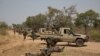 ARCHIVES - Des soldats réagissent à une embuscade pendant un entraînement lors de l'exercice Flintlock 2019 près de Po, au Burkina Faso, le 26 février 2019.