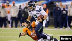 Para atlet dari liga NFL dalam permainan olahraga yang terkadang melibatkan kontak fisik yang keras itu.