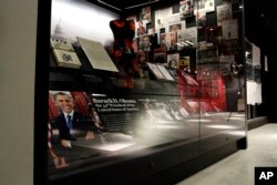 Smithsonian African American Museum: In this photo taken July 18, 2016, an exhibit depicting the presidency and the life of President Barack Obama and his family is seen during a media preview tour at the Smithsonian National Museum of African American History and Culture in Washington. The museum's grand opening will be on Sept. 24.