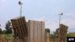 A picture taken on August 5, 2021, shows an Iron Dome defense system battery, designed to intercept and destroy incoming short-range rockets and artillery shells, in the Hula Valley in northern Israel near the border with Lebanon. - The Israeli air force 