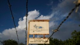This Oct. 21, 2021, photo shows a sign outside Christian Aid Ministries in Titanyen, Haiti. (AP Photo/Matias Delacroix, File)