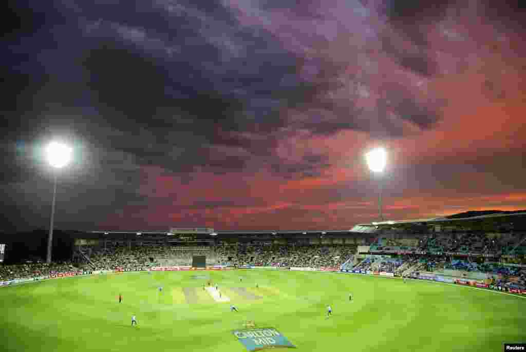 A general view shows the One Day International (ODI) tri-series cricket match between Australia and England as the sun sets at Bellerive Oval in Hobart, Tasmania.