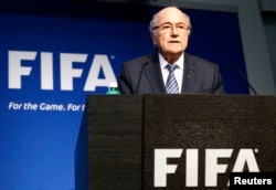 FILE - FIFA President Sepp Blatter addresses a news conference at the FIFA headquarters in Zurich, Switzerland.