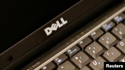 A Dell Latitude D430 laptop computer is seen in New York August 26, 2008. Dell Inc posted a surprisingly steep drop in quarterly earnings and said companies around the world are cutting back on technology spending, sending its shares tumbling and sparking