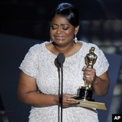 Octavia Spencer accepts the Oscar for best actress in a supporting role for “The Help” during the 84th Academy Awards on Sunday, Feb. 26, 2012, in Hollywood.
