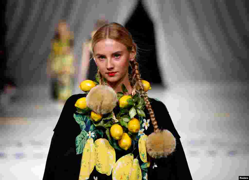 A model presents a creation by designer Tokuko Maeda from her Spring/Summer 2017 collection for her brand TOKUKO 1er VOL during Tokyo Fashion Week in Tokyo.