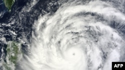 This NASA Terra satellite image obtained September 19, 2013 shows Typhoon Usagi nearing the Philippines and southern Taiwan. 