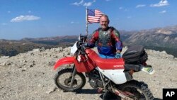 This August 2021 photo provided by Julie O’Hara shows Jim Parsons, a 57-year-old Alabama man who was declared brain-dead from a September 2021 dirt bike racing accident. Parsons’ family donated his body for research at the University of Alabama at Birming