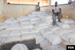 Bags of maize ready for distribution at Dzaleka refugee camp in Malawi. (Lameck Masina/VOA)