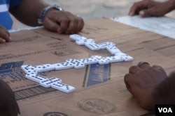 A game of dominoes being played in Colombia.