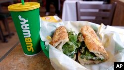 FILE - Ireland’s Supreme Court has ruled that bread sold by the fast-food chain Subway, seen here on Feb. 23, 2018, contains so much sugar that it cannot be legally defined as bread. (AP Photo/Charles Krupa, File)