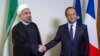 لوموند: شراب "دیدار رسمی" روحانی و اولاند را به "دیدار کاری" تبدیل کرد