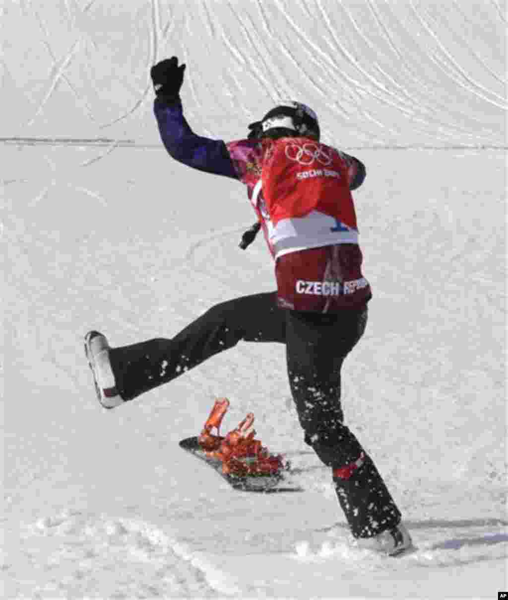 Czech Republic's Eva Samkova celebrates after taking the gold medal in the women's snowboard cross final at the Rosa Khutor Extreme Park, at the 2014 Winter Olympics, Sunday, Feb. 16, 2014, in Krasnaya Polyana, Russia. (AP Photo/Andy Wong)