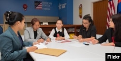 Five Cambodian women entrepreneurs discuss during a meeting at the U.S. Embassy in Phnom Penh, before they head to the United States to take part in a leadership program sponsored by the U.S. State Department, in Phnom Penh, Sept. 10, 2018. (Rick Albertson, U.S. Embassy in Cambodia)