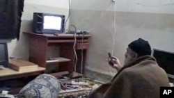 Osama bin Laden is shown watching himself on television in this video image released by the U.S. Pentagon, May 7, 2011