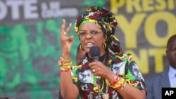 FILE - Zimbabwe's first lady, Grace Mugabe, addresses party supporters at a ZANU PF Rally in Chinhoyi in this July 29, 2017 