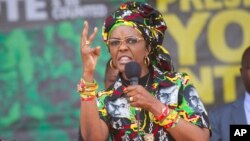 FILE - Zimbabwe's first lady, Grace Mugabe, addresses party supporters at a ZANU PF Rally in Chinhoyi in this July 29, 2017 