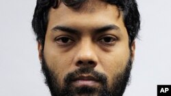 This undated photo released by the Ministry of Home Affairs shows Rahman Mizanur, one of four Bangladeshi men convicted in a Singapore Court on Tuesday, May 31, 2016.