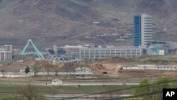 FILE - The Kaesong industrial complex in North Korea is seen from inside the demilitarized zone during a press tour in Paju, South Korea, April 24, 2018.