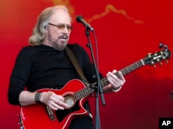 FILE - Singer Barry Gibb performs in Somerset, England, June 25, 2017.