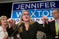 Democrat Jennifer Wexton speaks at her election night party after defeating Rep. Barbara Comstock, R-Va., Nov. 6, 2018, in Dulles, Virginia.