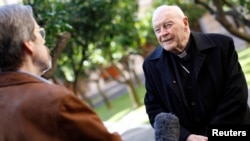 FILE - Cardinal Theodore McCarrick speaks during an interview at the North American College at the Vatican, Feb. 14, 2013. 