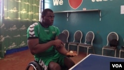 George Wyndham practices table tennis at the National Stadium in Freetown, Sierra Leone, March 12, 2016. (N. deVries/ VOA news)