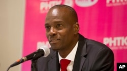 FILE - Presidential candidate Jovenel Moise, from the PHTK political party, gives a press conference in Port-au-Prince, Haiti, Oct. 19, 2015.