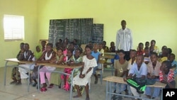 Students at Thiabakh elementary school sit in the classroom at Ndioum refugee camp in Ndioum, Senegal, November 2011.