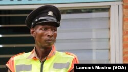 Kanduwa Sande is a police officer with a greater passion for sports. (Lameck Masina/VOA)