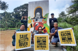 Warga Santan, Kutai Kartanegara gelar aksi tolak tambang batu bara, 26 September 2021, sekaligus memperingati Hari Sungai. (Foto: Courtesy/JATAM)