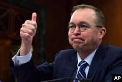 FILE - Budget director Mick Mulvaney testifies before the Senate Budget Committee on Capitol Hill in Washington, Feb. 13, 2018.