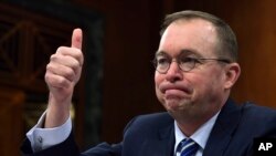 FILE - Budget Director Mick Mulvaney testifies before the Senate Budget Committee on Capitol Hill in Washington, Feb. 13, 2018. He was chosen Dec. 14, 2018, to become President Donald Trump's acting chief of staff. 