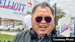 Pere Pen, a Cambodian-American, wore his voted sticker on his forehead after he cast his vote in the municipal elections in Lowell, Massachusetts, Nov. 7, 2017. (Courtesy photo of Sidney Liang) 