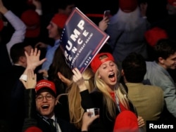 Trump supporters celebrate as they watch election returns come in at Republican presidential nominee Donald Trump's election night rally in Manhattan, New York, Nov. 8, 2016.