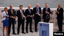 Jean Bennett, Albert Maguire, Robin Ali, James Bainbridge, Samuel Jacobson, T. Michael Redmond and Portugal's President Marcelo Rebelo de Sousa attend the 2018 Antonio Champalimaud Vision Awards ceremony at Champalimaud Foundation in Lisbon, Portugal, Sept. 4, 2018.