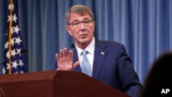 Defense Secretary Ash Carter speaks during a news conference at the Pentagon, where he announced new rules allowing transgender individuals to serve openly in the U.S. military, June 30, 2016. 