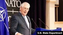U.S. Secretary of State Rex Tillerson delivers remarks during a press availability at NATO in Brussels, Belgium, Dec. 6, 2017. Tillerson said the United States is convinced the incidents harming the health of U.S. Embassy workers in Cuba were "targeted attacks."