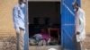 Staff at the teaching hospital in Malakal, Upper Nile state, open the doors of the morgue to add the body of another person killed during the conflict.